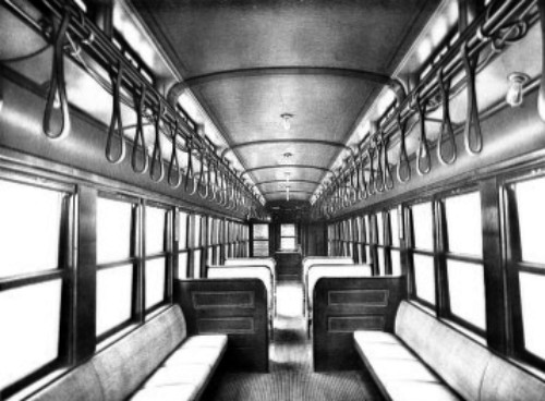INTERIOR VIEW OF PROTECTED WOODEN CAR