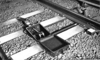 PNEUMATIC TRACK STOP, SHOWING STOP TRIGGER IN UPRIGHT POSITION